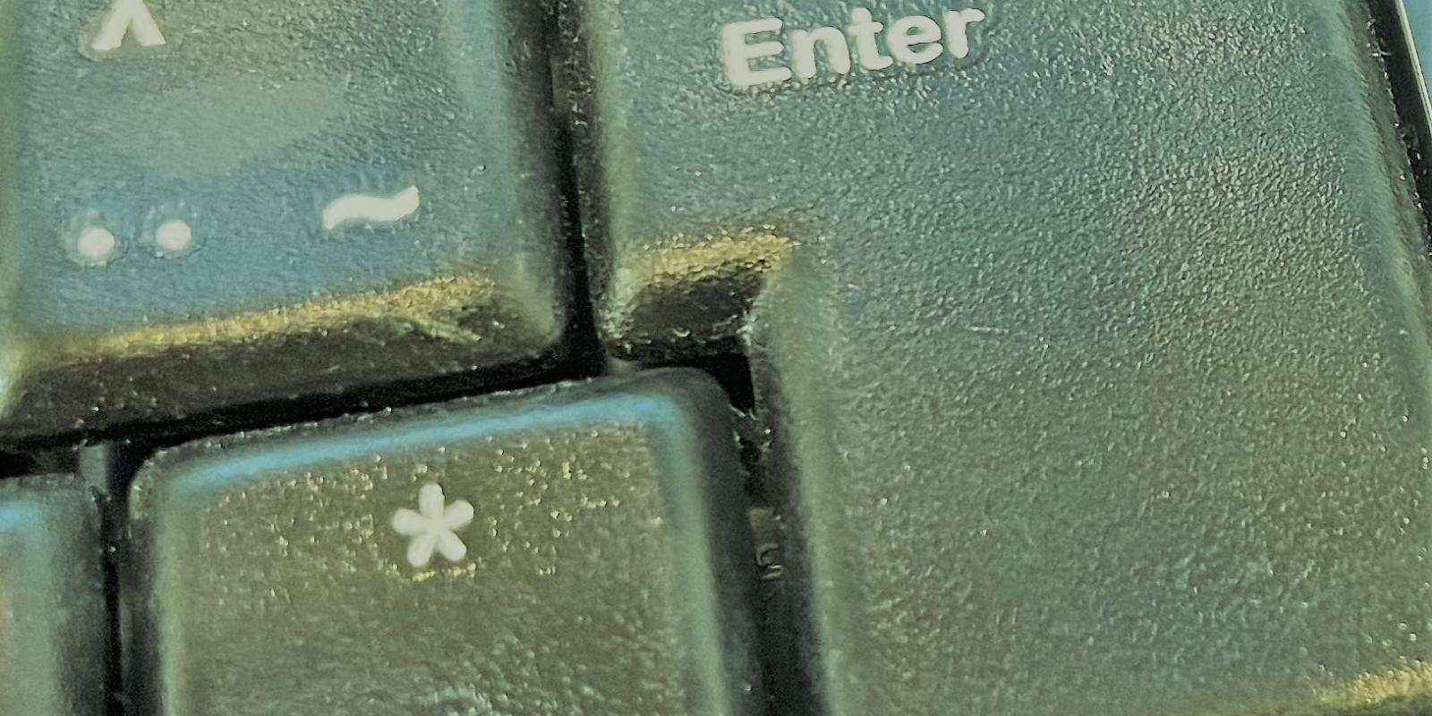Billede af en entertast på computertastatur